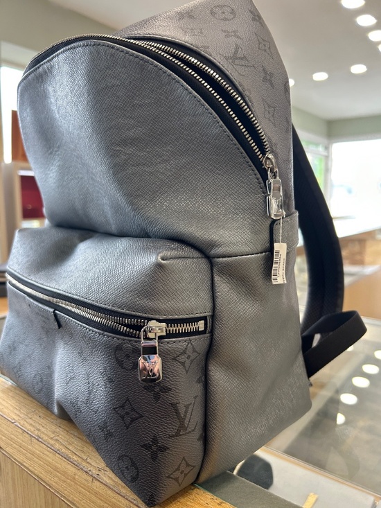 Pre Owned Louis Vuitton PM Discovery Backpack Monogram Taigarama